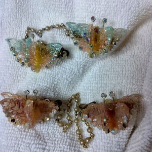 Sweater clips butterfly plastic with sparkles, two pair, marked pat 2853761